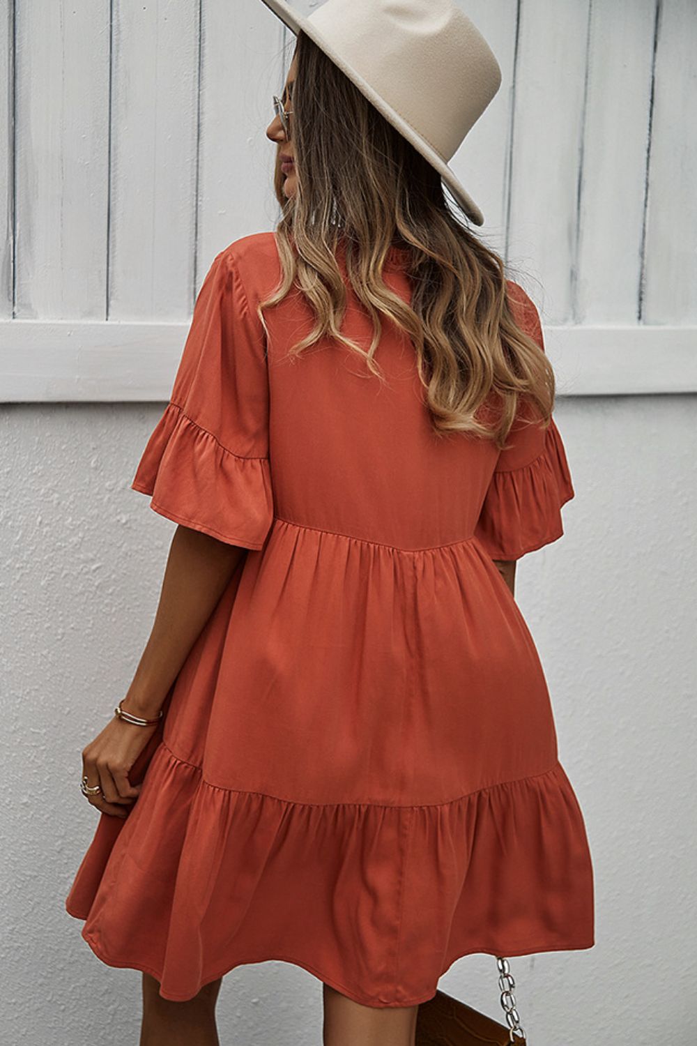 Buttoned Tie Neck Tiered Mini Dress